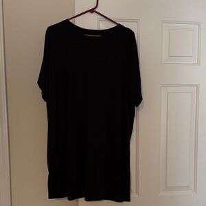 Classic Black Women’s Dress. Very Casual. Has pockets on front.